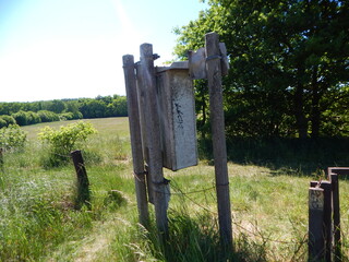 wooden fence in a field