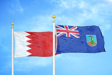 Bahrain and Montserrat two flags on flagpoles and blue sky