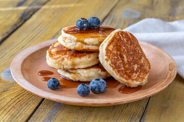 Stack of ricotta pancakes on the plate