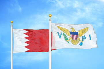 Bahrain and Virgin Islands United States two flags on flagpoles and blue sky