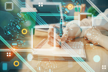 Multi exposure of writing hands on background with data solution hologram. Technology concept.
