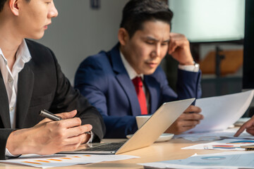 Unhappy business people dispute work problem at office . Business bankrupt failure and loss concept .