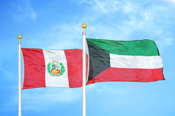 Naklejka na ściany i meble Peru and Kuwait two flags on flagpoles and blue sky
