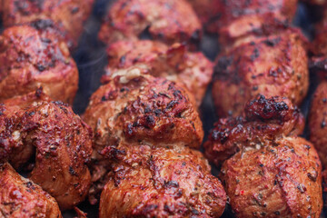Delicious shish kebab is prepared on the grill