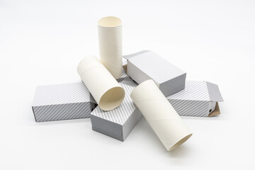 A pile of discarded renewable paper tubes and cartons