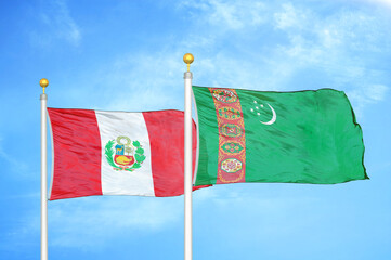 Peru and Turkmenistan two flags on flagpoles and blue sky