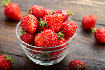 fresh strawberries on wooden background