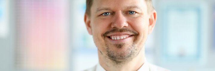 Fototapeta premium Caucasian adult smiling businessman office portrait. Business online education concept