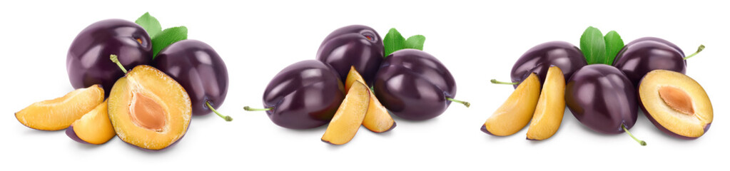 fresh purple plum and slices with leaves isolated on white background with clipping path and full depth of field. Set or collection