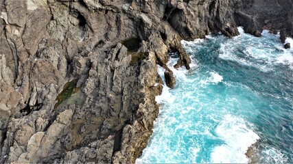 mighty ocean spitting out the cliffs