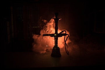 Hookah hot coals on shisha bowl with black background. Stylish oriental shisha. Shisha Concept