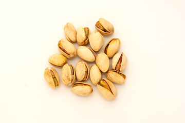 Pistachio salted nuts, healthy snack on white background.