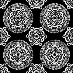 seamless pattern, abstraction in monochrome colors, mandala, ornament for wallpaper and fabric, wrapping paper, background for different designs