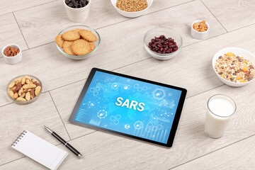 Healthy Tablet Pc compostion with SARS inscription, immune system boost concept