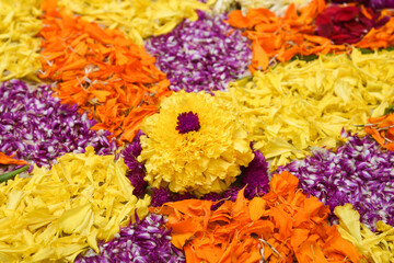 Kerala Onam festival Flower bed or Pookalam decoration, seamless floral pattern of tropical fresh flowers on  Onam, Vishu celebration of Kerala, India. Indian festival Diwali.