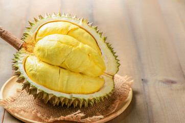 Durian (Kan yao) or Durio zibthinus Murray on wood plate. King of fruits of Thailand