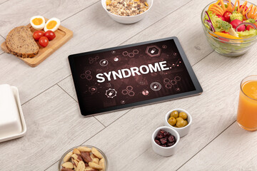 Healthy Tablet Pc compostion with SYNDROME inscription, immune system boost concept