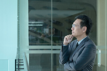 Portrait of a Chinese businessman, side view.