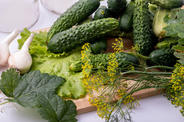 Fresh cucumbers, garlic and herbs.