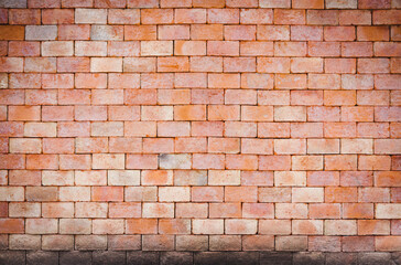 Old orange clay brick wall with crusted stains. Old brick wall texture background, rough surface.There is a copy space to put text.
