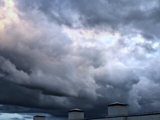 Fototapeta na wymiar storm clouds over the town