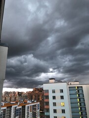 storm clouds over city