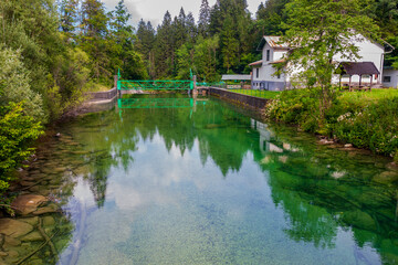 cozy little dam for generating electricity in a mountain alpine village