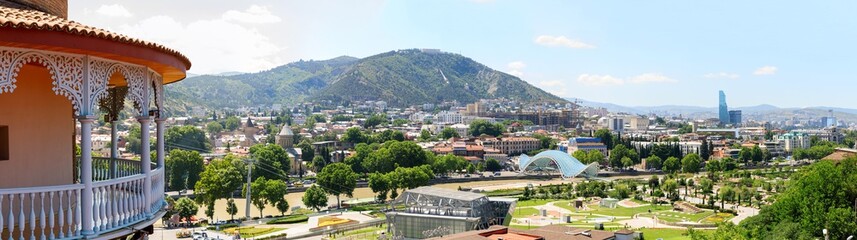 Traditional Georgian architecture and panoramic view of Tbilisi city, old town and modern architecture. Tbilisi the capital of Georgia © miklyxa