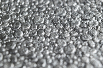 Grey styrofoam background texture closeup. Macro shot  texture of grey polystyrene foam or styrofoam pattern