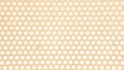 Cream-white metal grid, perforated with spherical holes aligned next to each other