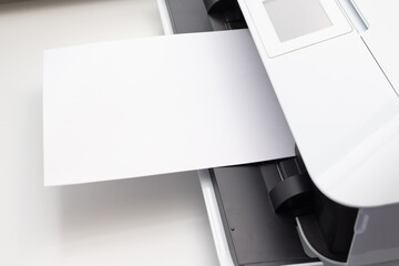 Office printer prints documents on paper