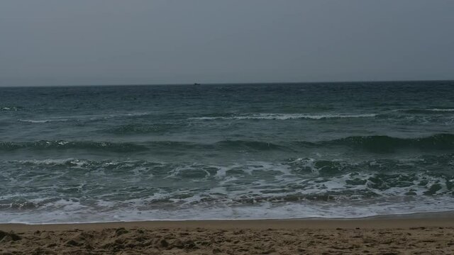 Ocean waves crashing and foaming.