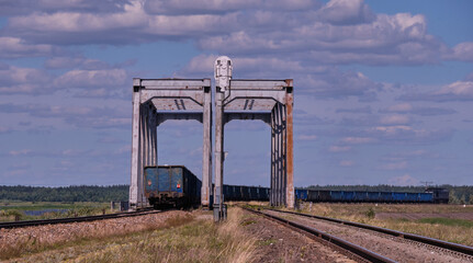 Twin railway bridge against blue sky