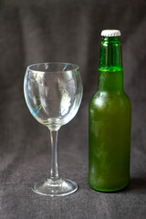 bottle with beer and glass