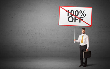 business person holding a traffic sign with 100% OFF inscription, new idea concept