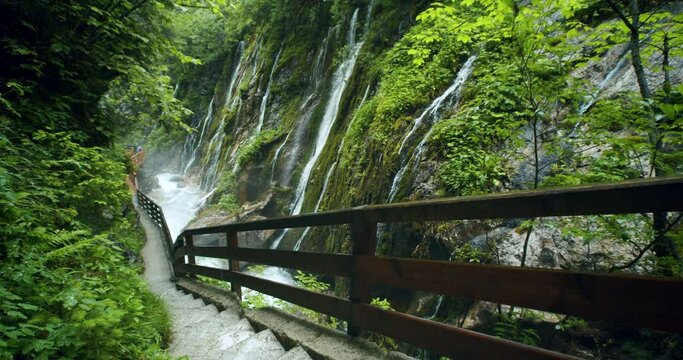 Ramsau, Berchtesgaden, Germany. Beautiful Wimbachklamm gorge with several small waterfall streams and wooden hiking path along