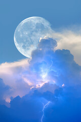 Lightning strikes between blue stormy clouds with full moon  "Elements of this image furnished by NASA"   
