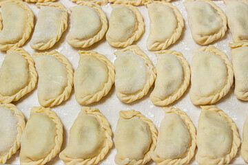 Vareniki. Homemade dumplings. Handmade dough food. Russian kitchen.