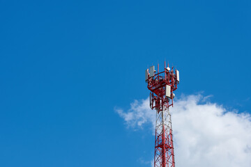 mobile tower. pillar against the blue sky