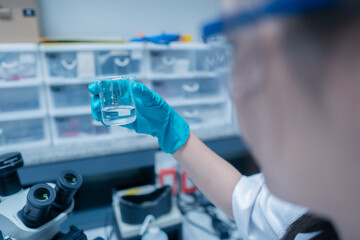 Asian scientist working in the lab,Researchers are research to find the results of the...