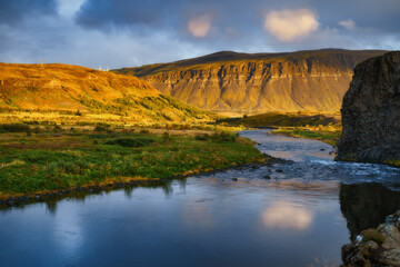 Iceland beautiful nature landscape at sunset. Mountain and river