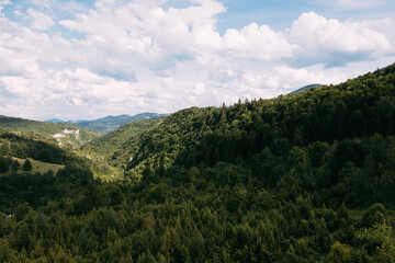 Naklejka premium View of a beautiful landscape of Zlatibor mountain range in Serbia