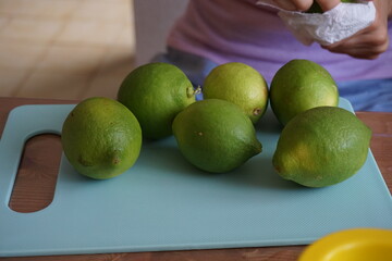 Slicing limes for lemonade and jam