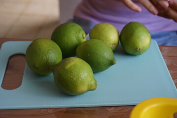 Slicing limes for lemonade and jam