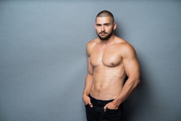 handsome young man posing in studio