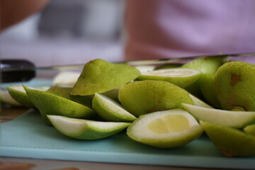 Slicing limes for lemonade and jam