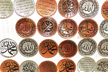ISTANBUL, TURKEY - APRIL 01, 2013: Metal magnets with signs at a souvenir shop. They are a popular souvenir for tourists.