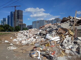  destroyed building, earthquake, pile of rubble and debris, city landfill