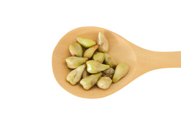 Grape seeds in wooden spoon isolated on white background