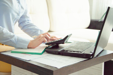  business woman working at home on the computer. online work